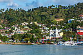 The colorful town of Samana on Samana Bay on the east coast of the Dominican Republic is a center for whale-watching from January through May.