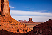 North Window view of the Utah monuments in the Monument Valley Navajo Tribal Park in Arizona. L-R: Elephant Butte (foreground), Brigham's Tomb, King on the Throne, Castle Butte, Bear and Rabbit, Stagecoach, East Mitten Butte.