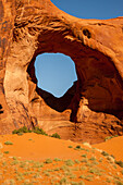 The Ear of the Wind, a natural sandstone arch in the Monument Navajo Valley Tribal Park, Arizona.