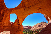 Spiderweb Arch, a large natural double arch in the Monument Valley Navajo Tribal Park in Arizona.