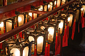 Rows of ornate lamps in the Man Mo Temple, a Buddhist temple in Hong Kong, China.