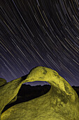 Star trails over Mobius Arch in the Alabama Hills near Lone Pine, California.