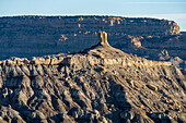Angel Peak Scenic Area near Bloomfield, New Mexico. A sandstone hoodoo above the Kutz Canyon badlands.