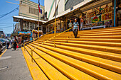 Famous yellow steps leading up to the Mercado Modelo in Santo Domingo, Dominican Republic.