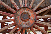 Detail of a wheel of an historic borax ore hauling wagon on display at Furnace Creek in Death Valley National Park in California.