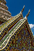 Detail of the Phra Vihara Yod Chapel by the Temple of the Emerald Buddha at the Grand Palace complex in Bangkok, Thailand.
