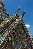 Detail of the Phra Vihara Yod Chapel by the Temple of the Emerald Buddha at the Grand Palace complex in Bangkok, Thailand.