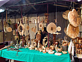 Carved wooden art pieces in a street market in the Old Town of Vilnius, Lithuania. A UNESCO World Heritage Site.