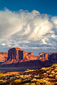 Clouds over Elephant Butte, a sandstone monolith in the Monument Valley Navajo Tribal Park in Arizona.