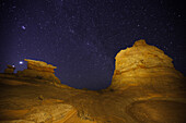 A Venus-Jupiter conjunction in the night sky over South Coyote Buttes in The Vermilion Cliffs National Monument in Arizona.