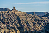 Angel Peak Scenic Area near Bloomfield, New Mexico. A sandstone hoodoo above the Kutz Canyon badlands.