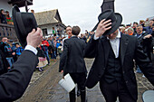 Water spraying ritual, traditional costumes and folk traditions at Easter Festival in Holl?k?, UNESCO World Heritage-listed village in the Cserh?t Hills of the Northern Uplands, Hungary.