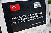 Sign indicates a mosque was repaired by Turkish Red Crescent Society, Weligama, Sri Lanka