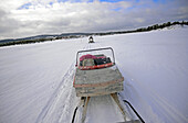 Snowmobile experience through wilderness of Lake Inari with VisitInari, Lapland, Finland