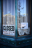 Closed sign in cafe at Market Street, San Francisco.