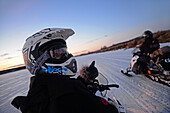 Snowmobile sunset tour with Arctic Lifestyle, Rovaniemi, Lapland, Finland.