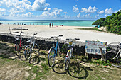 Parked bikes in Kondoi beach, Taketomi Island, Okinawa Prefecture, Japan