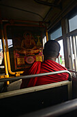 Buddhist monk in public bus, Sri Lanka