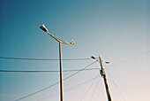 Analog photograph of two streetlights in Portugal