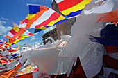 Prayer flags in Ruwanwelisaya, a stupa in Anuradhapura, Sri Lanka, considered a marvel for its architectural qualities and sacred to many Buddhists all over the world.