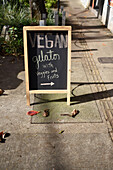 Sign indicates vegan ice cream available, El Poblado, Medellin, Colombia