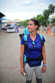 Young attractive female backpacker in Wellawaya bus station, Sri Lanka