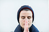 Close-up of woman meditating outdoors