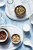 Overhead view of bowls with nuts on table