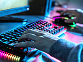 Teenage boy using keyboard and mouse