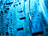 Close-up of fibre optics and computer circuit board