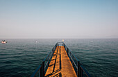 Wooden jetty and lake