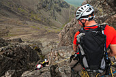 Climbers Ascending Am Basteir In The Black Cuillin; Isle Of Skye, Scotland