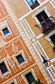 Tilted View Of The Ornate Facade Of A Residential Building; Barcelona, Spain