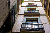 Low Angle View Of Balconies On An Apartment Building; Barcelona, Spain