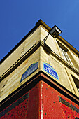 Corner Of A Building And Blue Sky In The Historical District Of The Marais; Paris, France