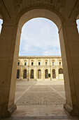 An Arched Walkway In The Old Quarter Of Lecce; Salento, Italy