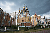 Church With Ornate Rooftop Surrounded By Residential Buildings; Kiev, Ukraine