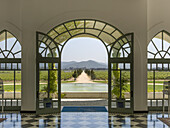 Arched Glass Doors Leading Out To A Vineyard, Casablanca Valley; Casablanca, Valparaiso, Chile