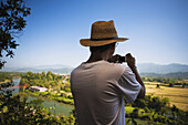 A Man Views The Countryside; Vang Vieng, Laos