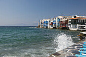 Crashing Waves In The Little Venice Area; Mykonos Town, Mykonos, The Cyclades, The Greek Islands, Greece