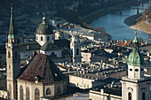 View Of The City From The Castle, Including The Bell Tower Of The Franciscan Church, The Cathedral And The River Salzach; Salzburg, Austria