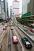 Central District In Hong Kong Island With Red Taxis In Traffic; Hong Kong, China