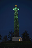 The Astoria Column Is Turned Green To Mark Domestic Violence Awareness Month; Astoria, Oregon, United States Of America