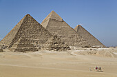 Camels With Tourist And Guide, The Giza Pyramids; Giza, Egypt