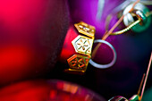 Extreme close up of red and purple Christmas baubles