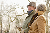 Mature couple walking in the park