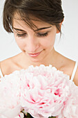 Woman Holding Pink Peonies