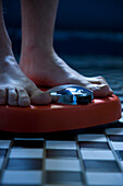 Close up of Feet on Weighing Scale
