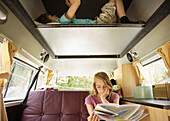 Boy and Girl in Recreational Vehicle