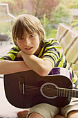 Boy Holding Guitar